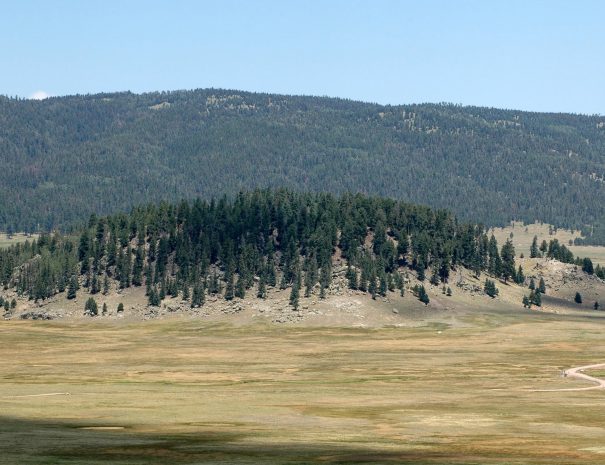 Sunset over volcanic peaks in Valles Caldera